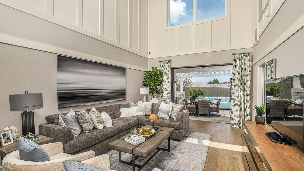 Two-story great room in the Anastasia model with pocket sliders opening to the lanai